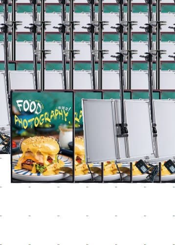 Cable-hung A3 lightboxes with food graphics in a shop window